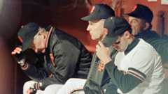 San Francisco Giants manager Roger Craig, (left), and first baseman Will Clark, (right), hang their heads