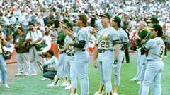 Members of the Oakland Athletics stand and stare 