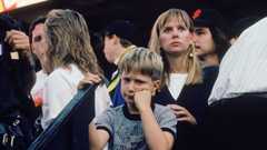 A young dejected baseball fan