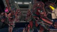 Spartan-IVs disembarking from a D79H Pelican during a Warzone simulation.