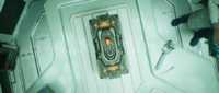 Overhead view of the "Didact's Gift" in an examination room aboard the Infinity.