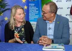Minister of Health and Wellness Dr Christopher Tufton in conversation with EU Ambassador, Dr Erja Askola.