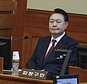 FILE- South Korea's impeached President Yoon Suk Yeol attends the fourth hearing of his impeachment trial over his short-lived imposition of martial law at the Constitutional Court in Seoul, South Korea, Thursday, Jan. 23, 2025. (Jeon Heon Kyun/Pool Photo via AP, File)