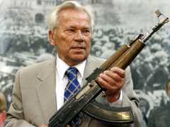 Mikhail Kalashnikov with an AK47