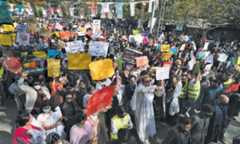 Rights activists participate in a march on Egerton Road to mark the International Women’s Day. — White Star