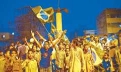 The passion for football cuts across all age groups: Brazil supporters during the World Cup congregate at Lyari’s Cheel Chowk | White Star