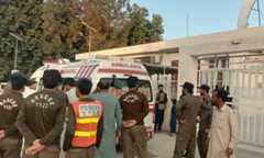 This photo shows rescue workers surrounding an ambulance carrying Momand blast victims outside District Headquarters Hospital, Bajaur.&mdash; Photo by author