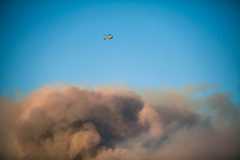 a helicopter above the Woolsey Fire