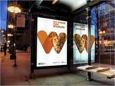 a bus stop with an advertisement for the wild life