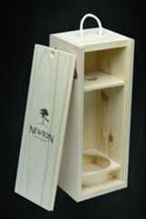 a wooden wine box with the door open and label on it that says newton winery