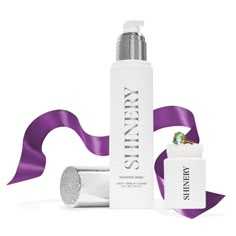 an empty white bottle next to a purple ribbon and tube of sunstand lotion