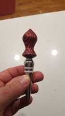 a person is holding an electronic device in their hand