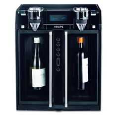 a black wine cooler with two bottles in front of it and a timer on the side