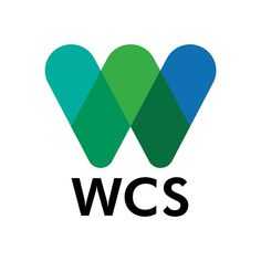 the w c s logo is shown in black and green, with two blue hearts