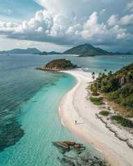 an aerial view of the beach and lagoons in front of some tropical island formations