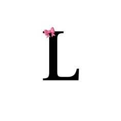 the letter l has a pink bow on it