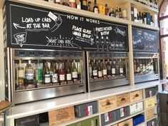 the wine bar is stocked with many different wines
