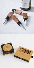 three different types of wooden wine openers