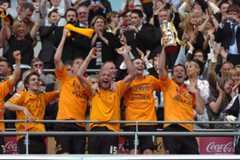 Hull City players celebrate the team's win over Bristol City in the Championship play-off at Wembley