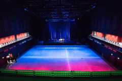 The arena is lit and ready for its first acts