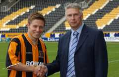 Nick Barmby shaking hands with Hull City chairman Adam Pearson after completing his free transfer to the KCOM Stadium in 2004