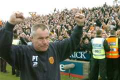 Peter Taylor celebrates Hull City's promotion out of Division Three in 2003-04