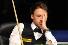Judd Trump looks flustered