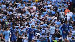Manchester City fans doing the 'Poznan' celebration