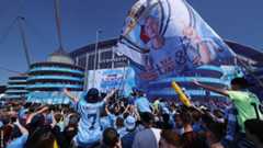 Manchester City fans celebrate the title win before kick off
