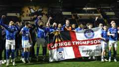 Stockport celebrate winning the title at Notts County's Meadow Lane