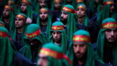 Lebanese Shia supporters of Hezbollah listen to the story of Imam Hussein in Beirut