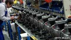 German man works on a production line