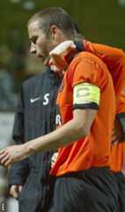 Dillon is consoled after his penalty miss proved decisive against Hearts