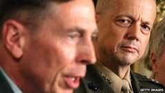 April 2011 file picture of David Petraeus (L) and Gen John Allen at the White House