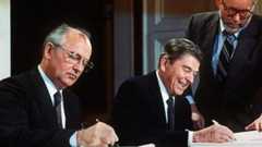 Mikhail Gorbachev and Ronald Reagan signing the INF Treaty in 1987