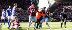 Jack Grealish on the floor after being attacked by a spectator