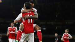 Mesut Ozil and Theo Walcott