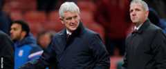 Mark Hughes leaves the pitch