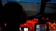 An RAAF AP-3C Orion makes final approach to Pearce airbase after an 11-hour search mission 24/03/2014