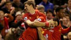 Steven Gerrard and Luis Suarez (right)