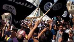 ISIS supporters demonstrate in front of the provincial government headquarters in Mosul, 360km (225 miles) north-west of Baghdad