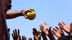 Iraqis at a food distribution at Khazir refugee camp outside of Irbil, 217 miles (350km) north of Baghdad