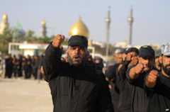 Volunteers train at military base in the Shia holy city of Najaf, 100 miles (160km) south of Baghdad, 17 June 2014