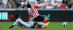 Wilfried Bony slides in on Maya Yoshida