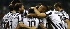 Juve players celebrate Carlos Tevez's opening goal