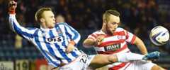 Kilmarnock's Chris Chantler battles for the ball with Dougie Imrie