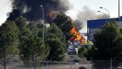 Smoke rises from the scene of the crash at Los Llanos air base in Albacete, eastern Spain (26 January 2015)