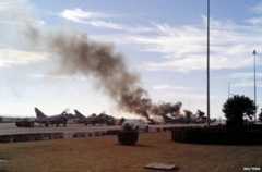 Smoke rises after a Greek F-16 aircraft which crashed at the Los Llanos air base in Albacete, eastern Spain (26 January 2015)