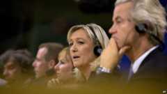 National Front leader Marine Le Pen, second right, speaks during a media conference at the European Parliament in Brussels on Tuesday, 16 June 2015