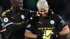 Sergio Aguero (right) clutches the match ball after scoring a hat-trick for Manchester City at Aston Villa